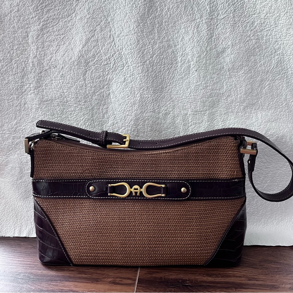 Vintage Etienne Aigner wicker rattan purse with leather trim.